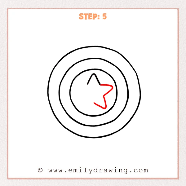 how to draw a captain americas shield - A partially drawn center star showing the right and lower-right points inside Captain America’s shield.